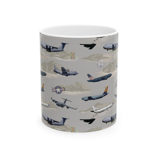 Beige ceramic mug featuring the AMC Tribute design, available in 11oz and 15oz sizes, with a glossy finish and comfortable C-handle.