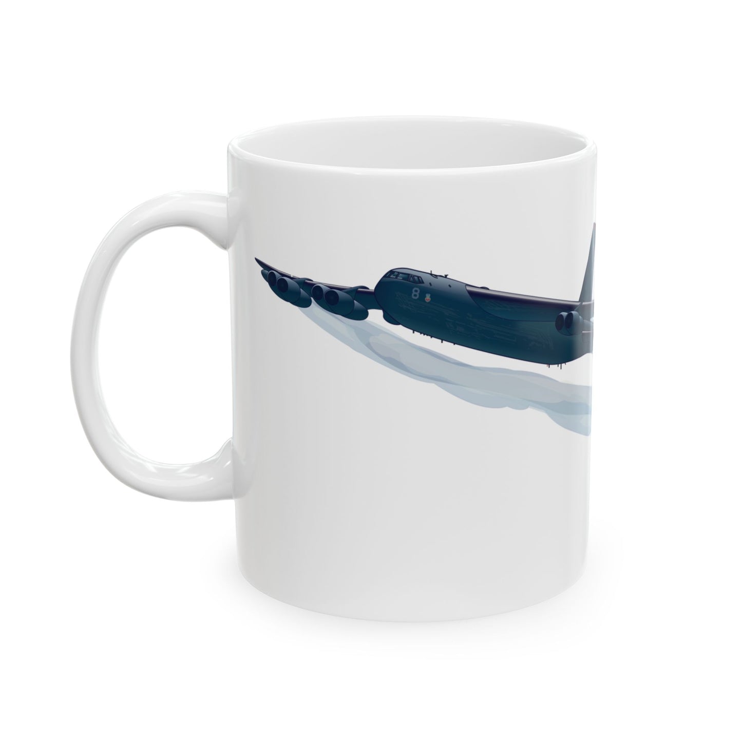 White ceramic mug featuring a tribute to the B-52 Stratofortress, available in 11oz and 15oz sizes, perfect for collectors of military aviation memorabilia.